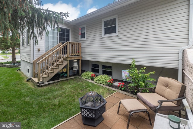 167 Canterbury Rd, Mount Laurel, NJ 08054 - rear view of property with a fire pit, a lawn, and a patio