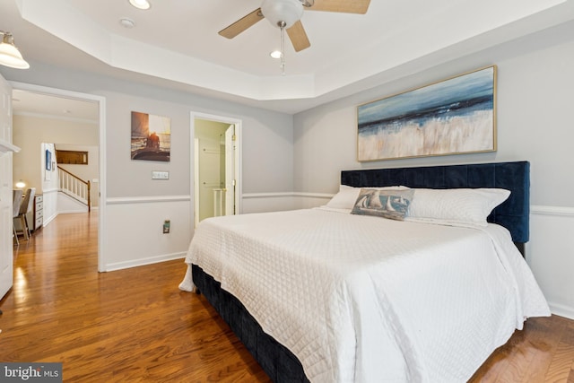 633 Ruxton Rd Unit 75, Solomons, MD 20688 - bedroom with a raised ceiling, recessed lighting, wood finished floors, baseboards, and ceiling fan