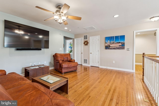 633 Ruxton Rd Unit 75, Solomons, MD 20688 - living room with light wood-style floors, a ceiling fan, recessed lighting, and baseboards