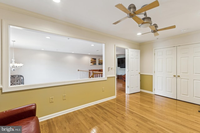 633 Ruxton Rd Unit 75, Solomons, MD 20688 - unfurnished room with a ceiling fan, wood finished floors, ornamental molding, recessed lighting, and a chandelier