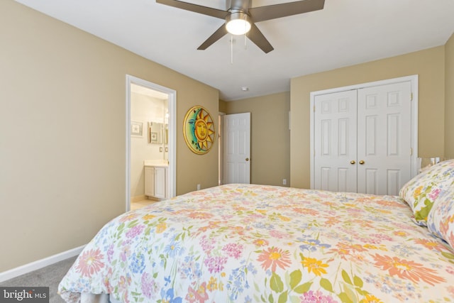 633 Ruxton Rd Unit 75, Solomons, MD 20688 - carpeted bedroom featuring a closet, baseboards, a ceiling fan, and ensuite bathroom