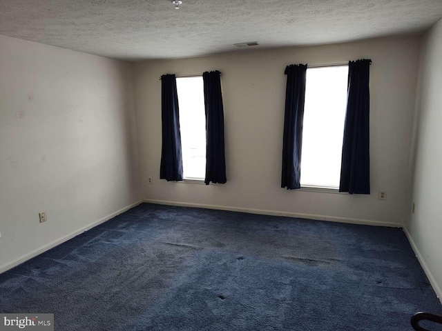 672 Jupiter Hills Ct, Arnold, MD 21012 - carpeted spare room featuring a textured ceiling, healthy amount of natural light, and baseboards