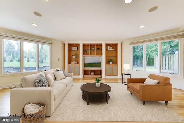 22 Slayback Dr, Princeton Junction, NJ 08550 - living area with healthy amount of natural light, recessed lighting, and light wood-type flooring