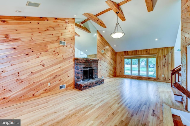 22 Slayback Dr, Princeton Junction, NJ 08550 - unfurnished living room featuring high vaulted ceiling, wooden walls, beam ceiling, wood finished floors, and stairway