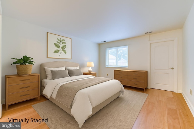 22 Slayback Dr, Princeton Junction, NJ 08550 - bedroom with light wood-style floors and baseboards