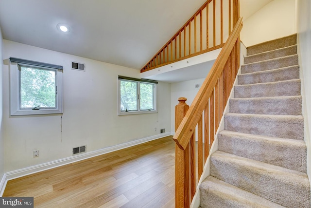 22 Slayback Dr, Princeton Junction, NJ 08550 - stairs with wood finished floors, vaulted ceiling, and recessed lighting