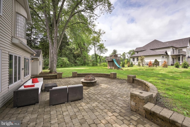 22 Slayback Dr, Princeton Junction, NJ 08550 - view of patio / terrace with a playground and an outdoor living space with a fire pit
