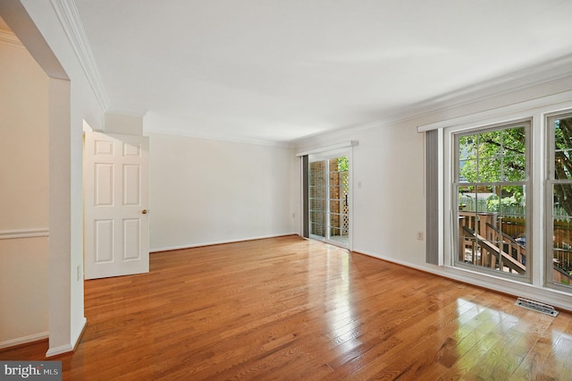 11707 Critton Cir, Woodbridge, VA 22192 - spare room featuring crown molding and wood finished floors
