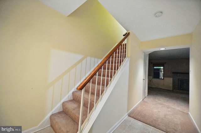 11707 Critton Cir, Woodbridge, VA 22192 - staircase with carpet flooring, a fireplace, and recessed lighting