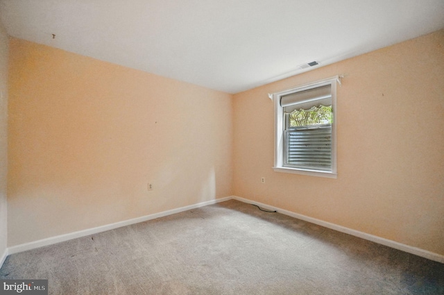 11707 Critton Cir, Woodbridge, VA 22192 - spare room featuring carpet flooring and baseboards