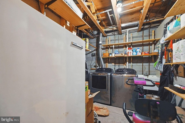 11707 Critton Cir, Woodbridge, VA 22192 - unfinished below grade area featuring washing machine and clothes dryer
