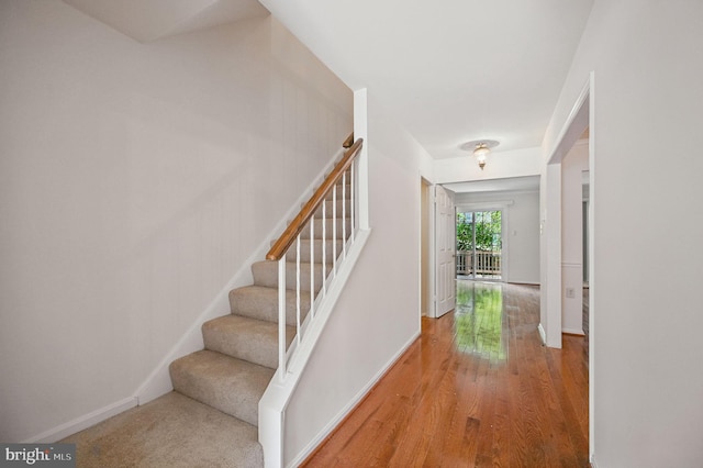 11707 Critton Cir, Woodbridge, VA 22192 - stairway with wood finished floors and baseboards