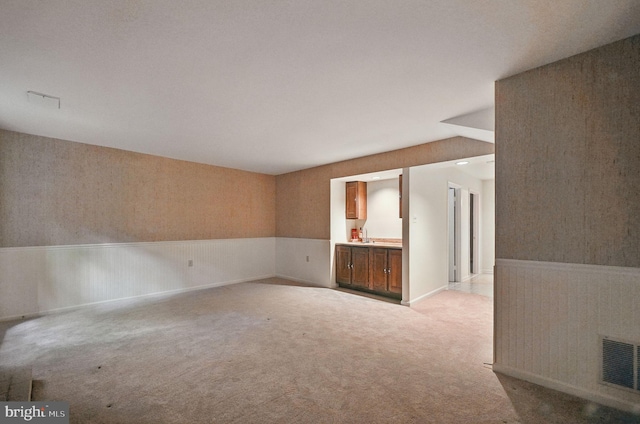 11707 Critton Cir, Woodbridge, VA 22192 - spare room featuring a wainscoted wall and light colored carpet