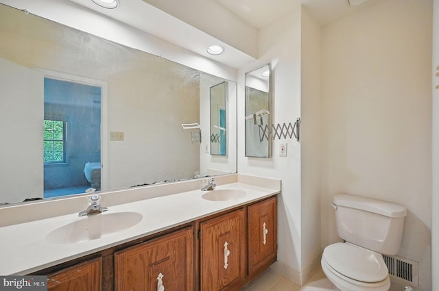 11707 Critton Cir, Woodbridge, VA 22192 - bathroom featuring double vanity, tile patterned flooring, and recessed lighting