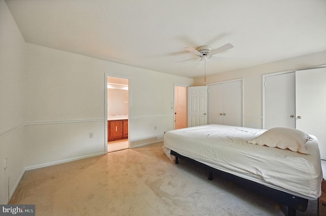 11707 Critton Cir, Woodbridge, VA 22192 - bedroom with light carpet, multiple closets, ensuite bath, and a ceiling fan