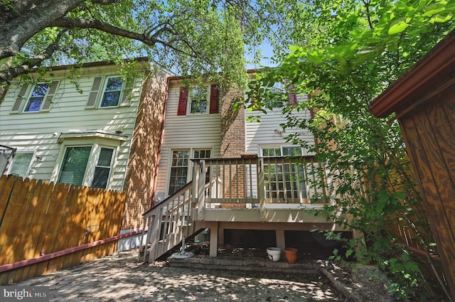 11707 Critton Cir, Woodbridge, VA 22192 - rear view of house featuring a wooden deck and stairs