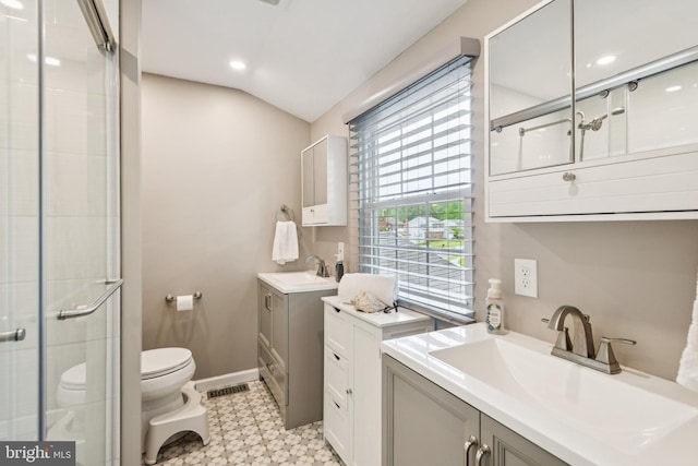 20 Hydra Ln, Sewell, NJ 08080 - full bath featuring toilet, tile patterned floors, a shower stall, two vanities, and baseboards