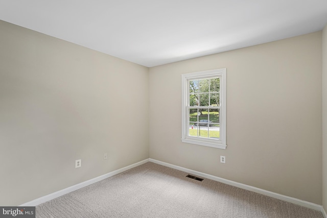8530 Raglan Rd, Vienna, VA 22182 - spare room with baseboards and carpet floors