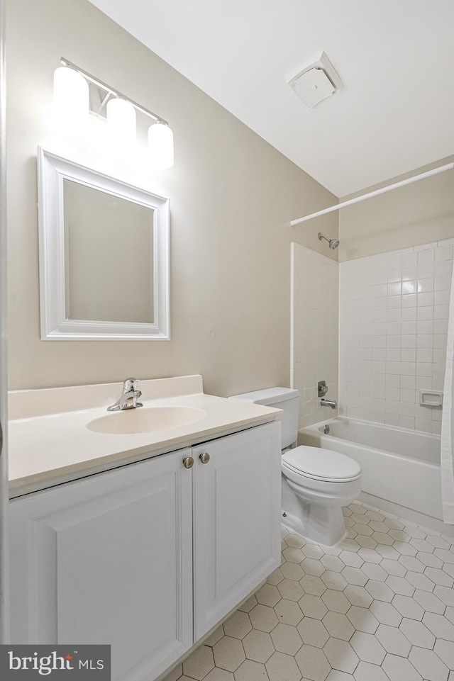 8530 Raglan Rd, Vienna, VA 22182 - bathroom featuring vanity, tile patterned flooring, and shower / washtub combination
