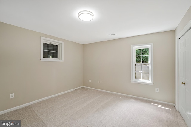 8530 Raglan Rd, Vienna, VA 22182 - unfurnished room with light colored carpet and baseboards