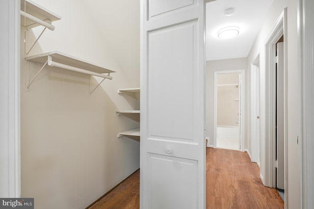8530 Raglan Rd, Vienna, VA 22182 - spacious closet featuring wood finished floors