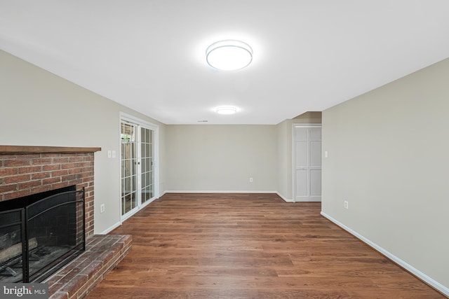 8530 Raglan Rd, Vienna, VA 22182 - unfurnished living room with a fireplace and wood finished floors