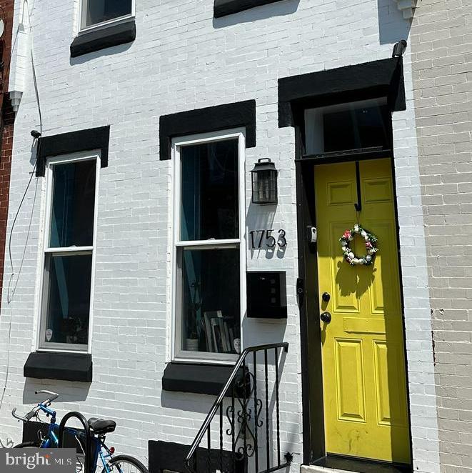 1753 S Dorrance St, Philadelphia, PA 19145 - view of exterior entry featuring brick siding