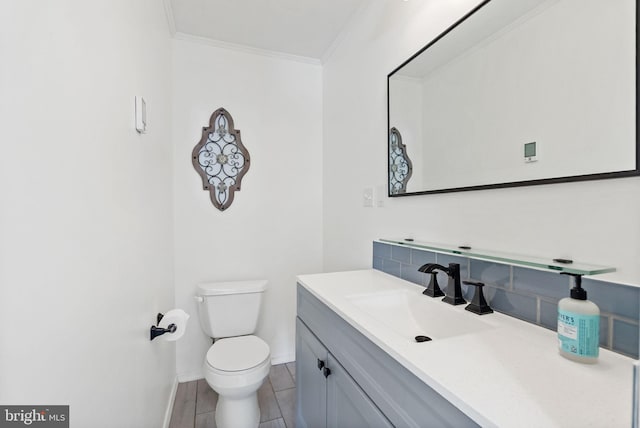 7407 Falmouth St, Springfield, VA 22150 - half bath with vanity, crown molding, and tasteful backsplash
