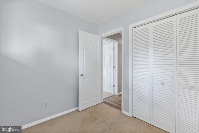 7407 Falmouth St, Springfield, VA 22150 - unfurnished bedroom featuring light carpet and a closet