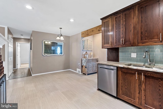 7407 Falmouth St, Springfield, VA 22150 - kitchen with stainless steel dishwasher, backsplash, dark brown cabinetry, pendant lighting, and recessed lighting