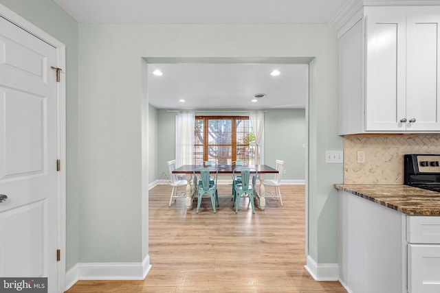 12542 Torquay Rd, Ocean City, MD 21842 - dining space featuring baseboards, light wood-style floors, and recessed lighting