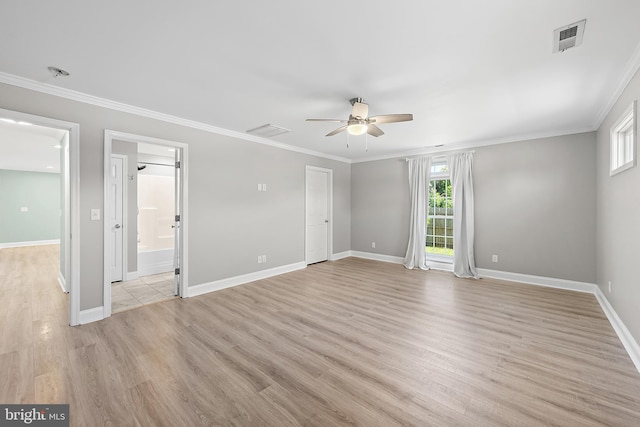 12542 Torquay Rd, Ocean City, MD 21842 - empty room with a ceiling fan, healthy amount of natural light, light wood-style floors, baseboards, and ornamental molding