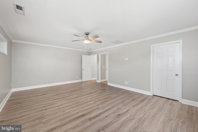 12542 Torquay Rd, Ocean City, MD 21842 - spare room featuring ceiling fan, light wood-style flooring, baseboards, and crown molding