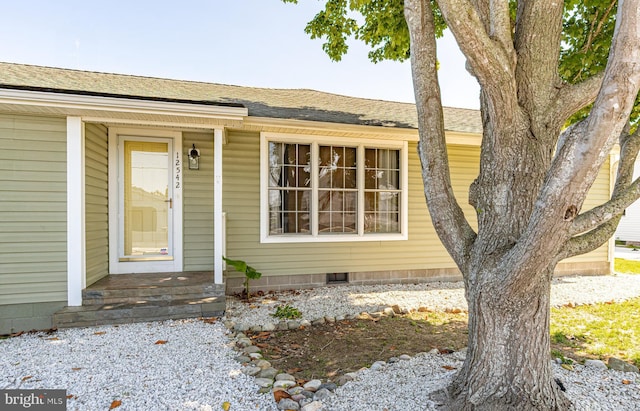 12542 Torquay Rd, Ocean City, MD 21842 - doorway to property with roof with shingles