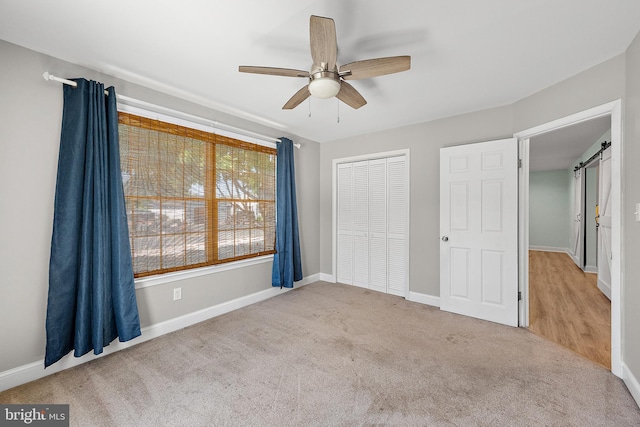 12542 Torquay Rd, Ocean City, MD 21842 - unfurnished bedroom with carpet, a closet, baseboards, and a ceiling fan