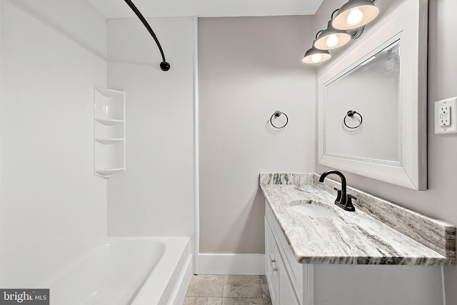 12542 Torquay Rd, Ocean City, MD 21842 - full bath featuring vanity, baseboards, and bathing tub / shower combination