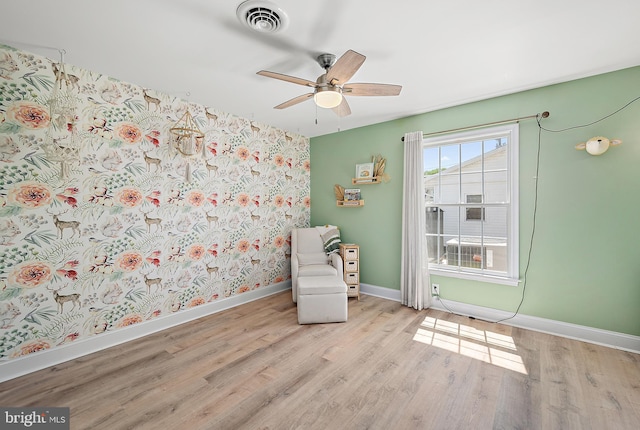 12542 Torquay Rd, Ocean City, MD 21842 - living area featuring baseboards, wood finished floors, and ceiling fan