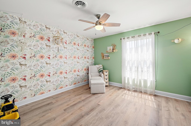 12542 Torquay Rd, Ocean City, MD 21842 - sitting room featuring wood finished floors, baseboards, and a ceiling fan