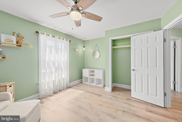 12542 Torquay Rd, Ocean City, MD 21842 - bedroom with wood finished floors, baseboards, a closet, and ceiling fan