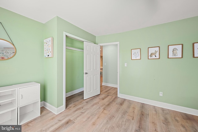 12542 Torquay Rd, Ocean City, MD 21842 - bedroom featuring wood finished floors, baseboards, and a closet