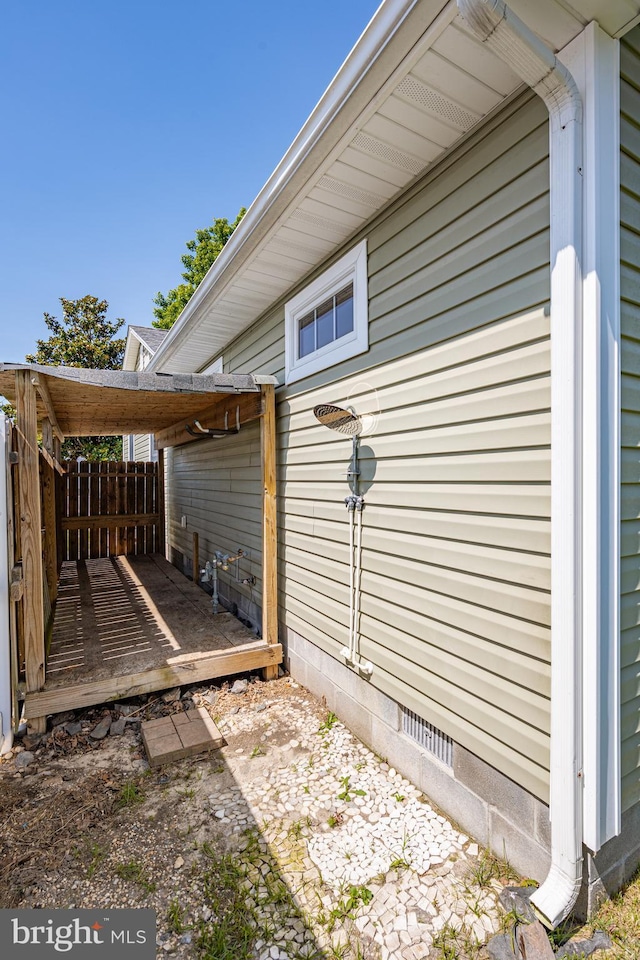12542 Torquay Rd, Ocean City, MD 21842 - view of property exterior featuring crawl space and a wooden deck