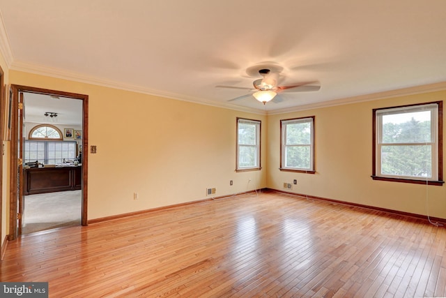 1 Willow Brook Ln, Annandale, NJ 08801 - spare room featuring ceiling fan, light wood-style flooring, crown molding, and baseboards