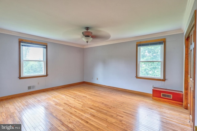 1 Willow Brook Ln, Annandale, NJ 08801 - empty room featuring ornamental molding, plenty of natural light, light wood finished floors, and a ceiling fan