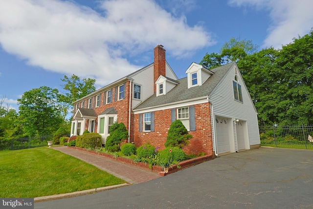 1 Willow Brook Ln, Annandale, NJ 08801 - colonial-style house featuring brick siding, an attached garage, driveway, a chimney, and roof with shingles