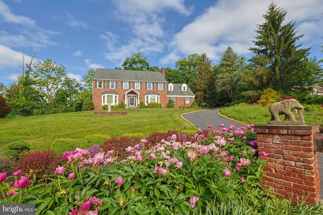 1 Willow Brook Ln, Annandale, NJ 08801 - view of front of home featuring a chimney, a front lawn, and brick siding