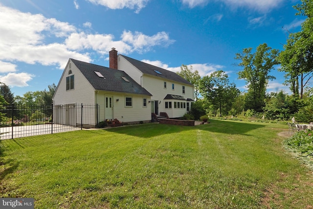 1 Willow Brook Ln, Annandale, NJ 08801 - rear view of house featuring a chimney, an attached garage, driveway, and a shingled roof