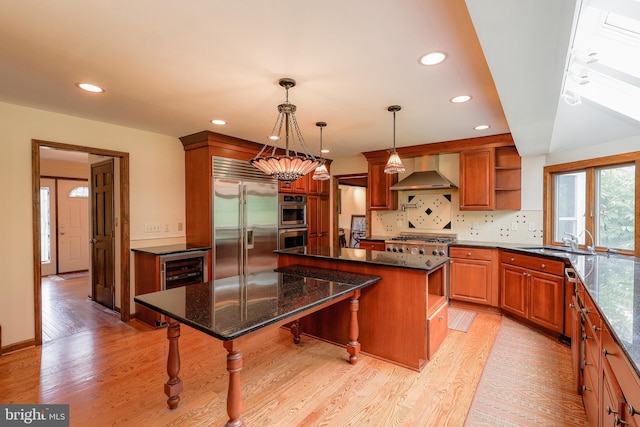 1 Willow Brook Ln, Annandale, NJ 08801 - kitchen with open shelves, stainless steel appliances, wall chimney exhaust hood, light wood-style floors, and recessed lighting