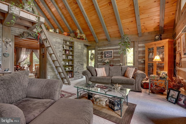 349 Covalt Rd, Needmore, PA 17238 - living room featuring carpet, wooden ceiling with exposed beams, high vaulted ceiling, and wooden walls