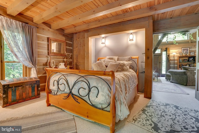 349 Covalt Rd, Needmore, PA 17238 - bedroom featuring wooden walls, carpet, wooden ceiling with exposed beams, and access to exterior