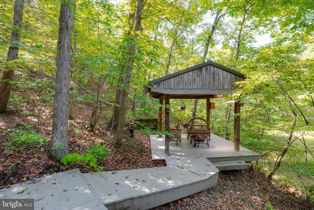 349 Covalt Rd, Needmore, PA 17238 - view of yard with an outdoor fire pit and a wooden deck